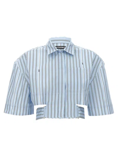 Jacquemus Bari Cropped Cutout Striped Cotton-poplin Shirt In Blue