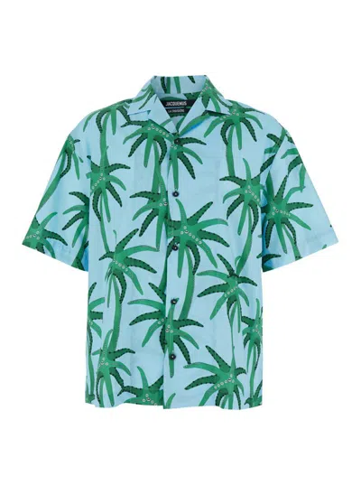 JACQUEMUS 'LA CHEMISE JEAN' LIGHT BLUE SHIRT WITH NOTCHED COLLAR AND ALL-OVER PALM TREE PRINT