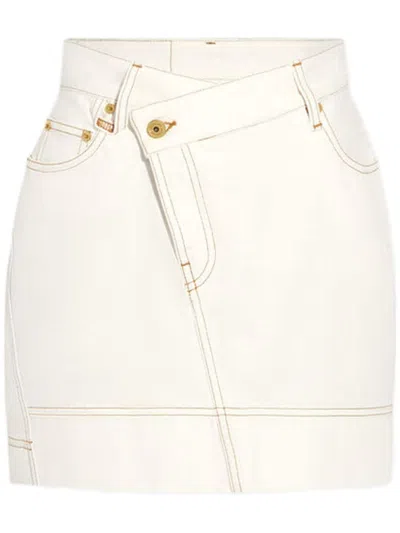 Jacquemus The De-nîmes Denim Mini Skirt In Off-white/tabac