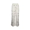 Jacquemus Wide-waist Printed Trousers With Button And Pocket Accents In White/black