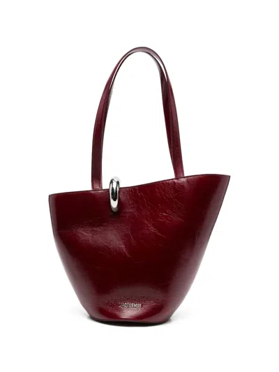 Pre-owned Jacquemus Le Bambola Moyen Leather Bucket Bag In Red