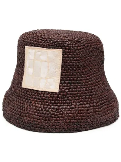 Jacquemus Ficiu Embroidered Raffia Bucket Hat In Brown