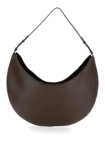 JACQUEMUS LE CALISSO ROND LARGE BROWN SHOULDER BAG WITH ADJUSTABLE STRAP AND EMBOSSED LOGO IN LEATHER WOMAN
