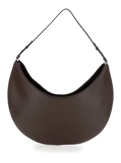 JACQUEMUS 'LE CALISSO ROND LARGE' BROWN SHOULDER BAG WITH ADJUSTABLE STRAP AND EMBOSSED LOGO IN LEATHER WOMAN