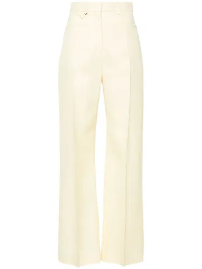 Jacquemus Flared High-waisted Tailored Trousers In Beige