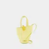Jacquemus Le Petit Bambola Asymmetric Mini Bucket Bag In Yellow