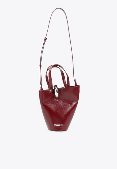 Jacquemus Le Petit Bambola Bucket Bag In Red