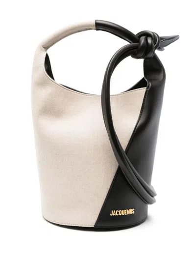 Jacquemus Le Petit Tourni Leather Bucket Bag In Pale Yellow/black
