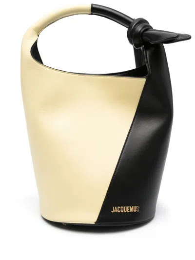 Jacquemus Le Petit Tourni Leather Bucket Bag In Pale Yellow/black