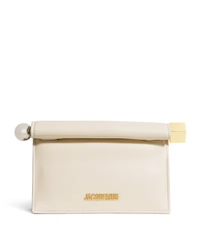 Jacquemus Leather La Petite Pochette Clutch Bag In 白色