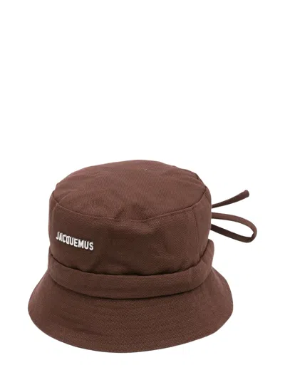 Jacquemus Logo Front Cotton Bucket Hat With Back Drawstring In Brown
