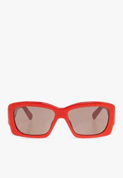 Jacquemus Logo Print Rectangular Sunglasses In Gray
