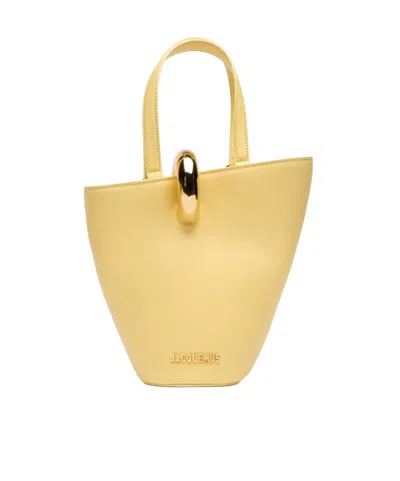 Jacquemus Le Petit Bambola Leather Bucket Bag In Light Yellow 210