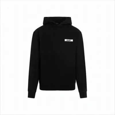 JACQUEMUS MINIMALIST BLACK HOODIE WITH SUBTLE TEXT PATCH