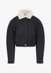 Jacquemus Le Bomber De-nimes Ovalo Blue Jacket With Fur Collar And Two Front Welt Pockets In Denim Woman In Black