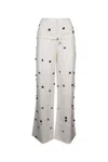 Jacquemus Wide-waist Printed Trousers With Button And Pocket Accents In Whiteblackdotsembroi