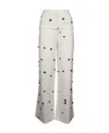 Jacquemus Wide-waist Printed Trousers With Button And Pocket Accents In White