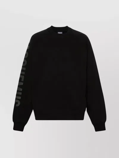 JACQUEMUS RAGLAN SLEEVE SWEATER WITH SIDE POCKETS