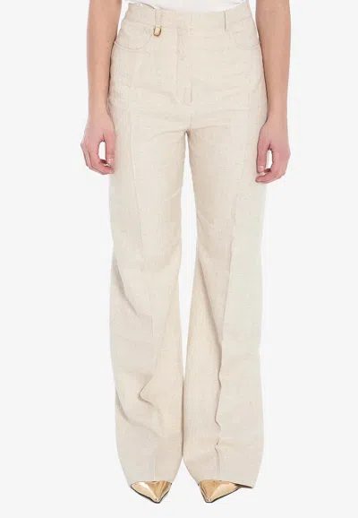 Jacquemus Sauge Flared Tailored Pants In Beige