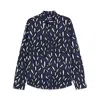 Jacquemus 'la Chemise Jean' Blue Shirt With Spread Collar And All-over Logo Motif In Blue/black
