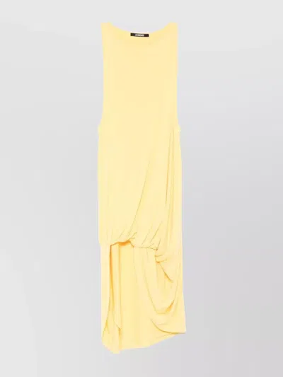 JACQUEMUS SHORT PEPLUM DRESS FEATURING ASYMMETRIC HEM