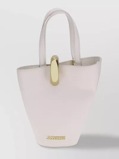 Jacquemus Small Leather Bucket Bag With Asymmetrical Silhouette In Neutral