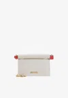 Jacquemus Pochette Small Embellished Leather-trimmed Canvas Clutch In Sand