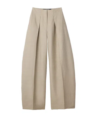 Jacquemus Smooth Curved Trousers In Neutral
