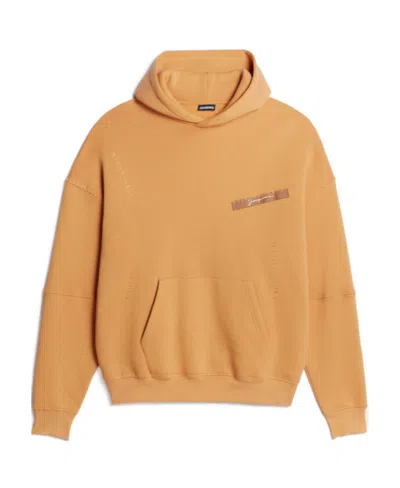 Jacquemus Stitch-detail Cotton Hoodie In Yellow