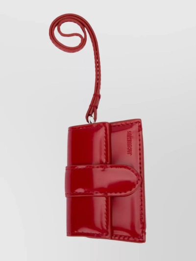 Jacquemus Strap Detail Folded Patent Wallet In Burgundy