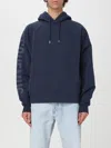 Jacquemus Relaxed Fit Cropped Hoodie With Raglan Sleeves In Blue