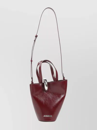 JACQUEMUS THE SMALL BAMBOLA CROSSBODY BAG