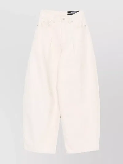 JACQUEMUS TROUSERS WITH PLEATED FRONT AND SIDE POCKETS