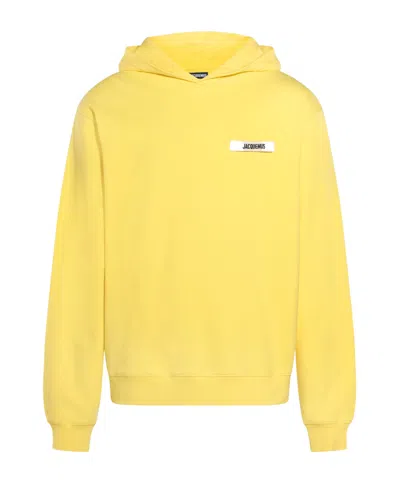 Jacquemus Typo Drawstring Hoodie In Yellow