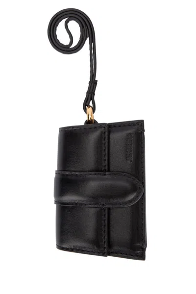 Jacquemus Strap Detail Wallet With Gold-tone Hardware In Black