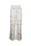 Jacquemus Wide-waist Printed Trousers With Button And Pocket Accents In White