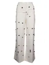 Jacquemus Wide-waist Printed Trousers With Button And Pocket Accents