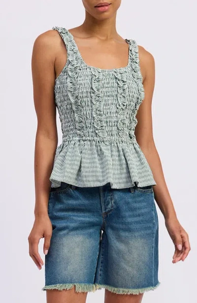 Jacquie The Label Kismet Ruffle Smocked Peplum Seersucker Top In Multi