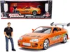 Jada 1995 Toyota Supra Orange Metallic With Lights And Brian Figurine "fast & Furious" Movie 1/18 Diecast