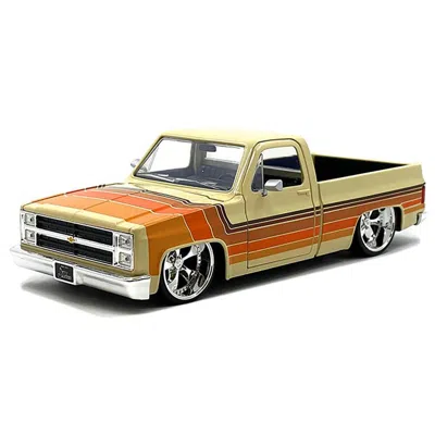 JADA TOYS JADA 1985 CHEVROLET C-10 PICKUP TRUCK BEIGE WITH STRIPES & CARTELLI WHEELS JUST TRUCKS SERIES 1-24 D