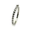 Jagged Halo Jewelry Women's Eternity Skull Hoop Earrings In White Gold Plated In Multi