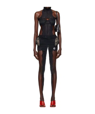 Jean Paul Gaultier And Shayne Oliver Collaborate On A Backless Dress In Black
