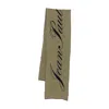 Jean Paul Gaultier Logo-detail Wool Scarf In Green