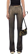Jean Paul Gaultier Spiral-print Trousers In Black