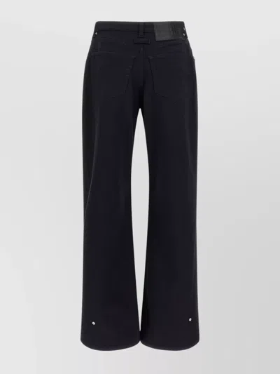 JEAN PAUL GAULTIER 'THE SNAP-BUTTON DENIM' TROUSERS