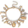 Jessica Simpson 20th Anniversary Mixed Charm Bracelet In Gold