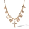 Jessica Simpson Gold-tone Textured Cross & Heart Charm Necklace In Gold