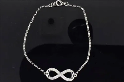 Pre-owned Jfl Diamonds & Timepieces Ladies 10k White Gold White Diamond Infinity Love Designer Charm On Bracelet