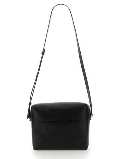 Jil Sander Logo-embossed Crossbody Bag In Black