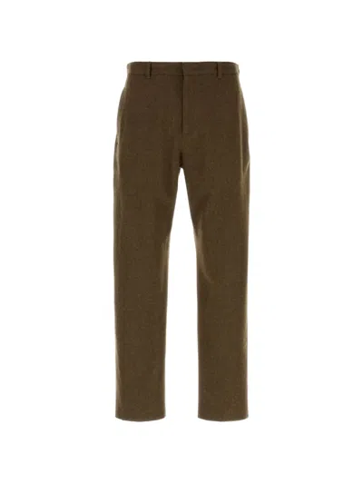 Jil Sander Belt-loop Flap-pocket Trousers In Gold
